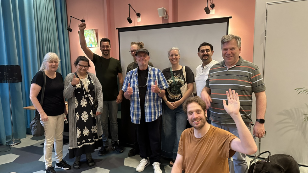 Acht deelnemers van de groep met projectleider Christiaan op de foto
